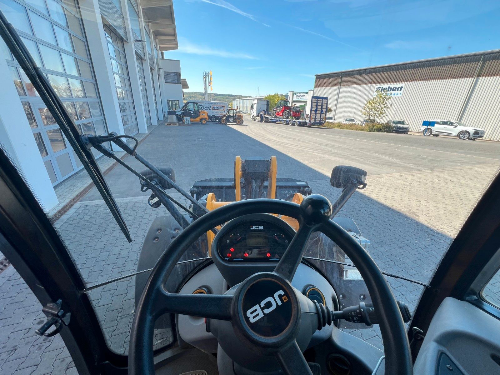 Fahrzeugabbildung JCB 409 SV / nur 758h! / Klappschaufel / Gabel