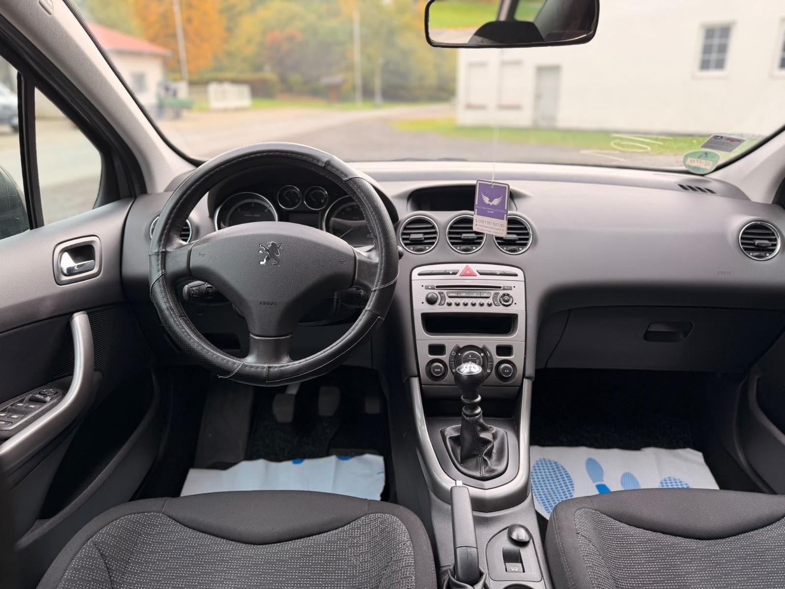 Peugeot 308 2009 — photo 15