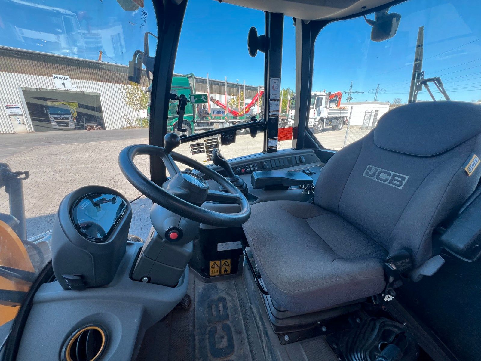 Fahrzeugabbildung JCB 409 SV / nur 758h! / Klappschaufel / Gabel
