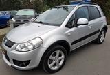 Suzuki SX4 1.9DDiS Club  *ALLRAD  *AHK *HU/AU-NEU! - silberne Suzuki SX4