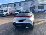 Toyota C-HR 1.8-l-VVT-i Hybrid Team Deutschland Tea... - gebrauchte Toyota C-HR aus dem Jahr 2023