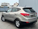 Hyundai TUCSON STYLE AWD T.LEDR+AHK+SHZ+PDC+KEYLES+EURO5 - Hyundai TUCSON in Ludwigshafen