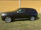 BMW X5 M50 M50d - - schwarze BMW X5 M50
