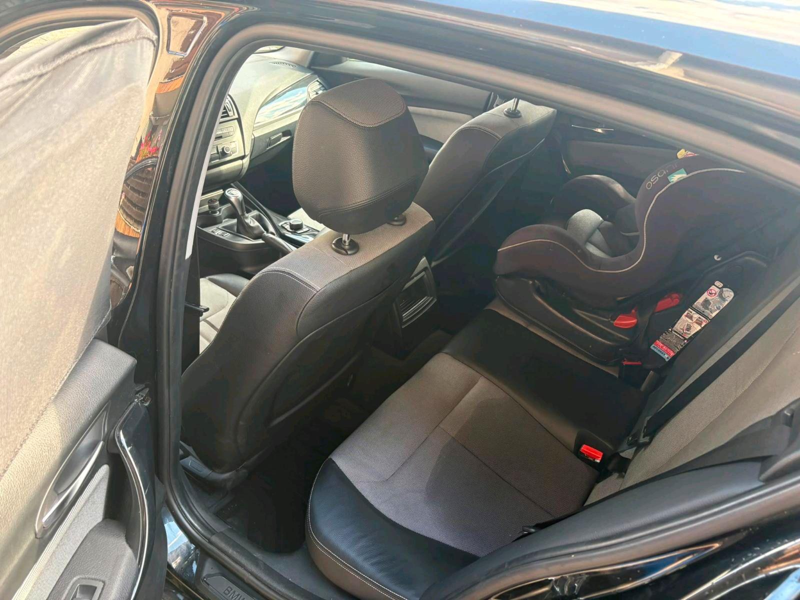 BMW 116 2011 — rear view