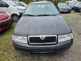 Skoda Octavia Combi 1.6 Ambiente Klimaautomatik S-H - gebrauchte Skoda Octavia aus dem Jahr 2004