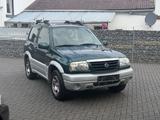 Suzuki Grand Vitara 1.6 4x4*KLIMA*TÜV&SERVICE NEU* - Suzuki Grand Vitara V6 mit Benzin-Antrieb