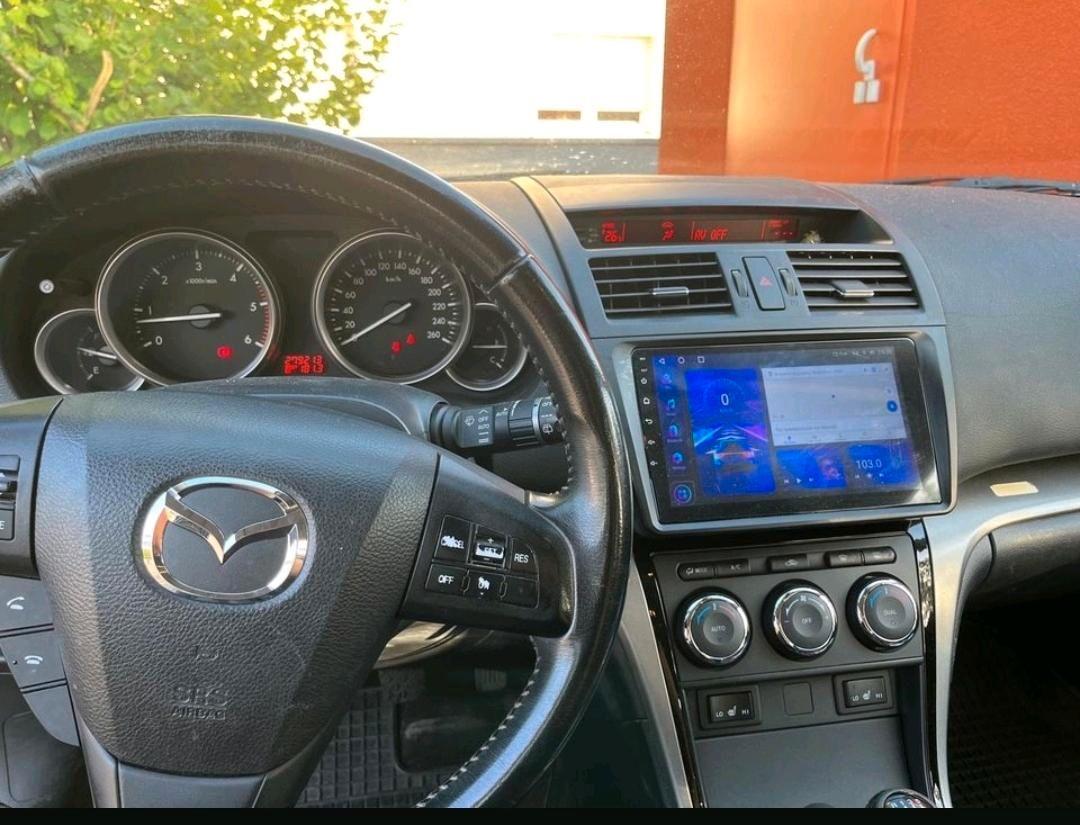 Mazda 2 2010 — photo 5