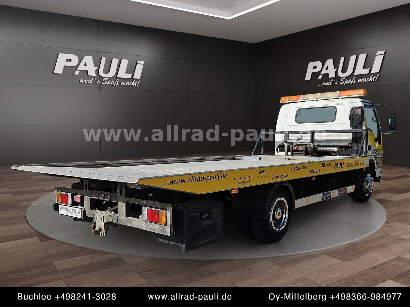 Isuzu N-Serie NPR85P - Schlepper | Schiebeplateau