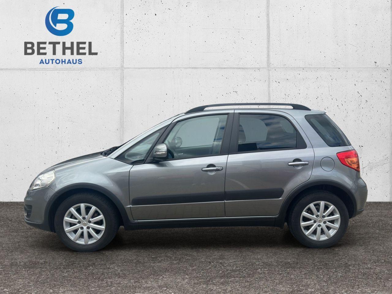 Suzuki SX4 1.6 Automatik  Style, Navi, PDC, Shz.