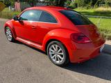 Volkswagen New Beetle 63.400 km, orange, top Zust. + Ausstg - VW New Beetle von privat