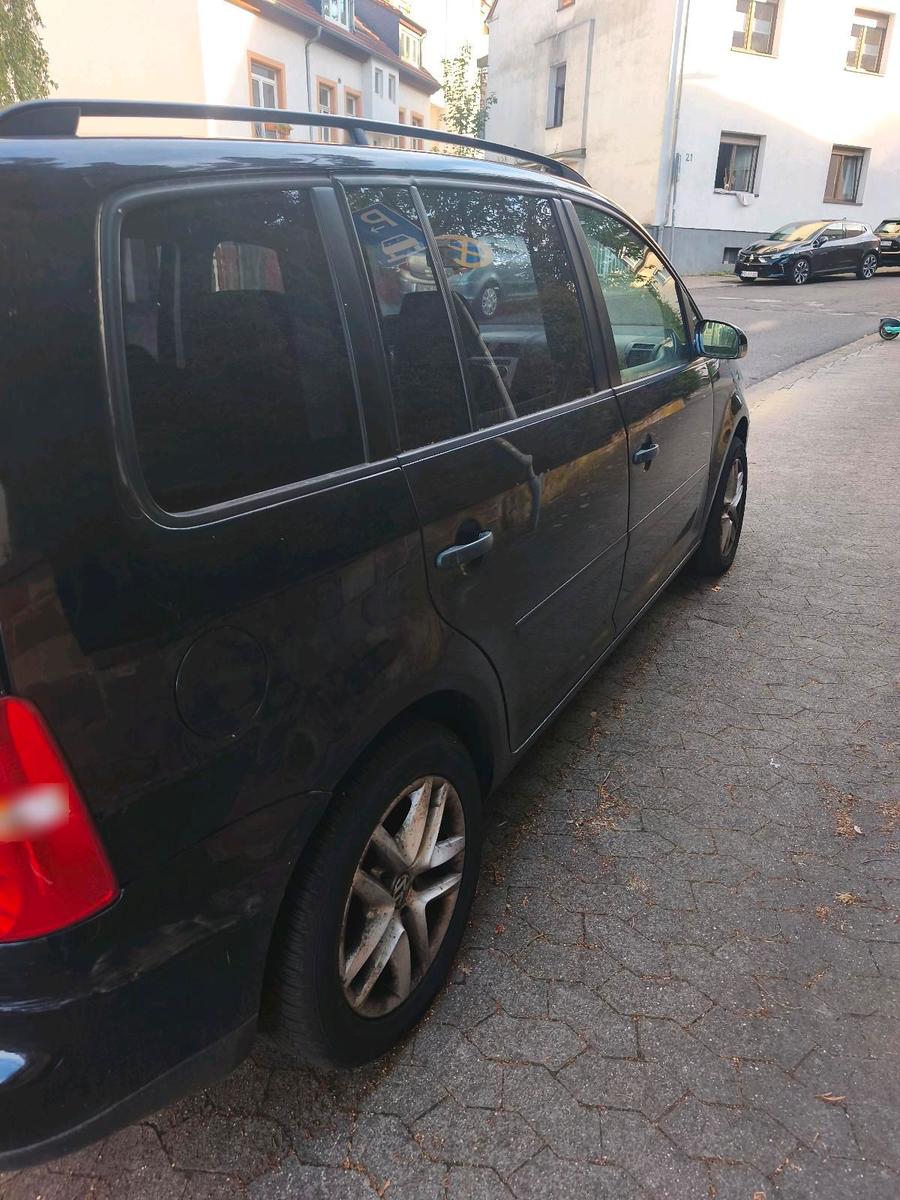 Volkswagen Touran 2006 — engine 105 HP (77kW)
