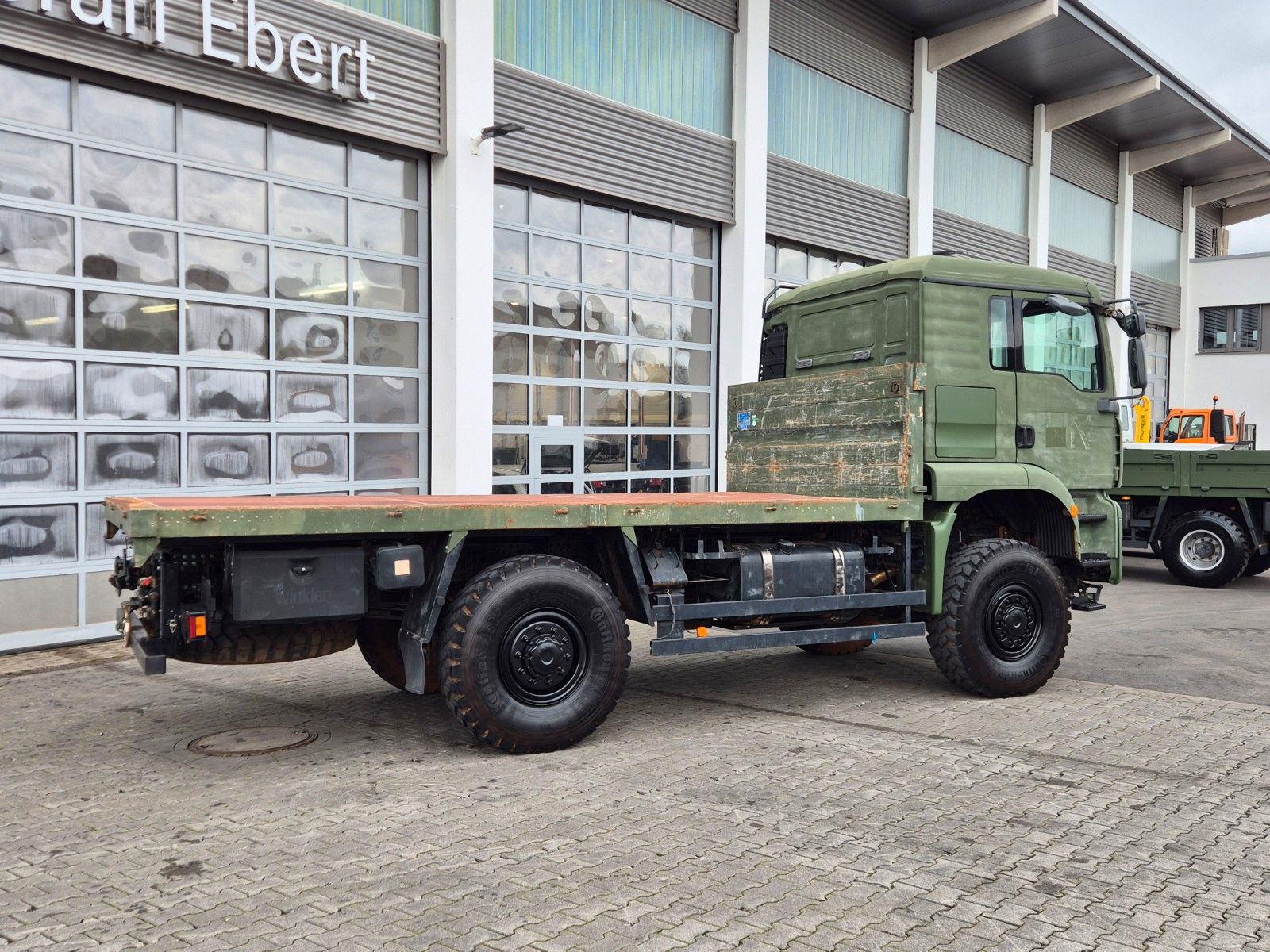 Fahrzeugabbildung MAN TGA 18.360 4x4 BB Pritsche Single Bereifung