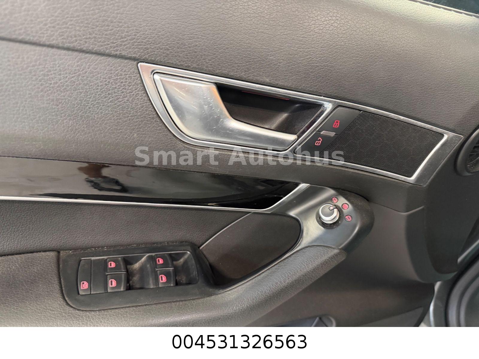 Audi A6 2009 — photo 21