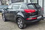 Kia Sportage Spirit 2WD Kamera Navi AHK Teilleder - Kia Sportage Gebrauchtwagen in München