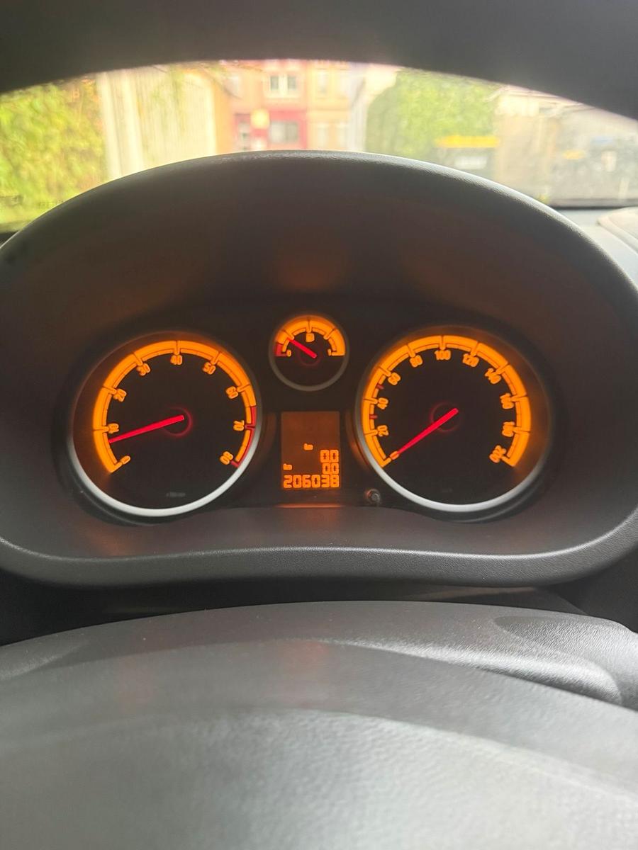 Opel Corsa 2010 — photo 8