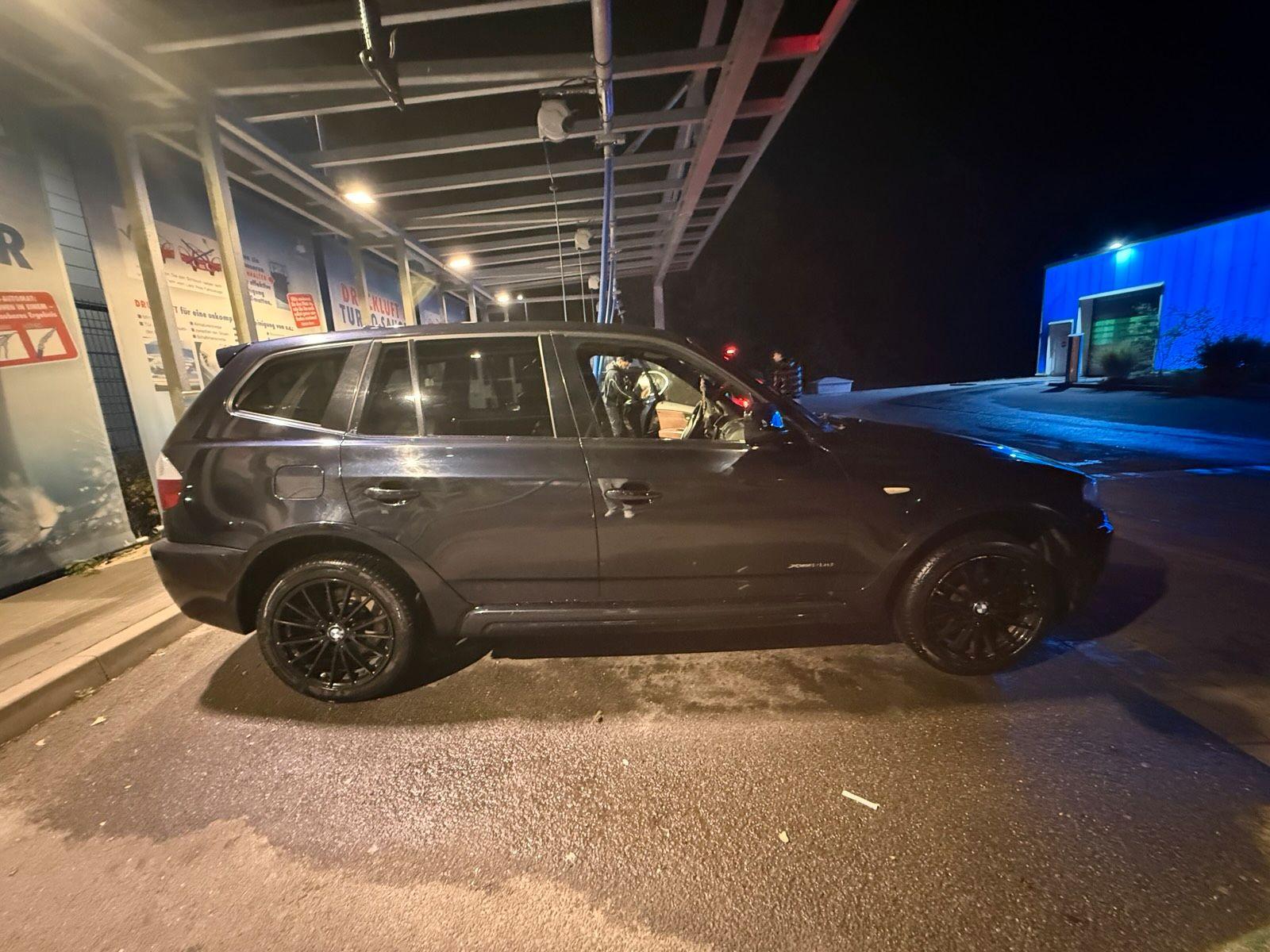BMW X3 2010 — rear view