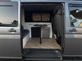 Volkswagen T5 Camper+Küche 4M AUT.°STANDHNZNG°KAMERA°NAVI - Volkswagen T5 Caravelle mit Diesel-Antrieb