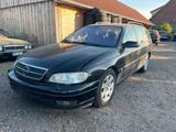 Opel Omega B Caravan 2.5 V6 - Opel Omega mit Benzin-Antrieb: Kombi, Klimaanlage, B Caravan