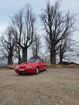 Opel Calibra 2.0i wenig Kilometer, kaum Rost - rote Opel Calibra