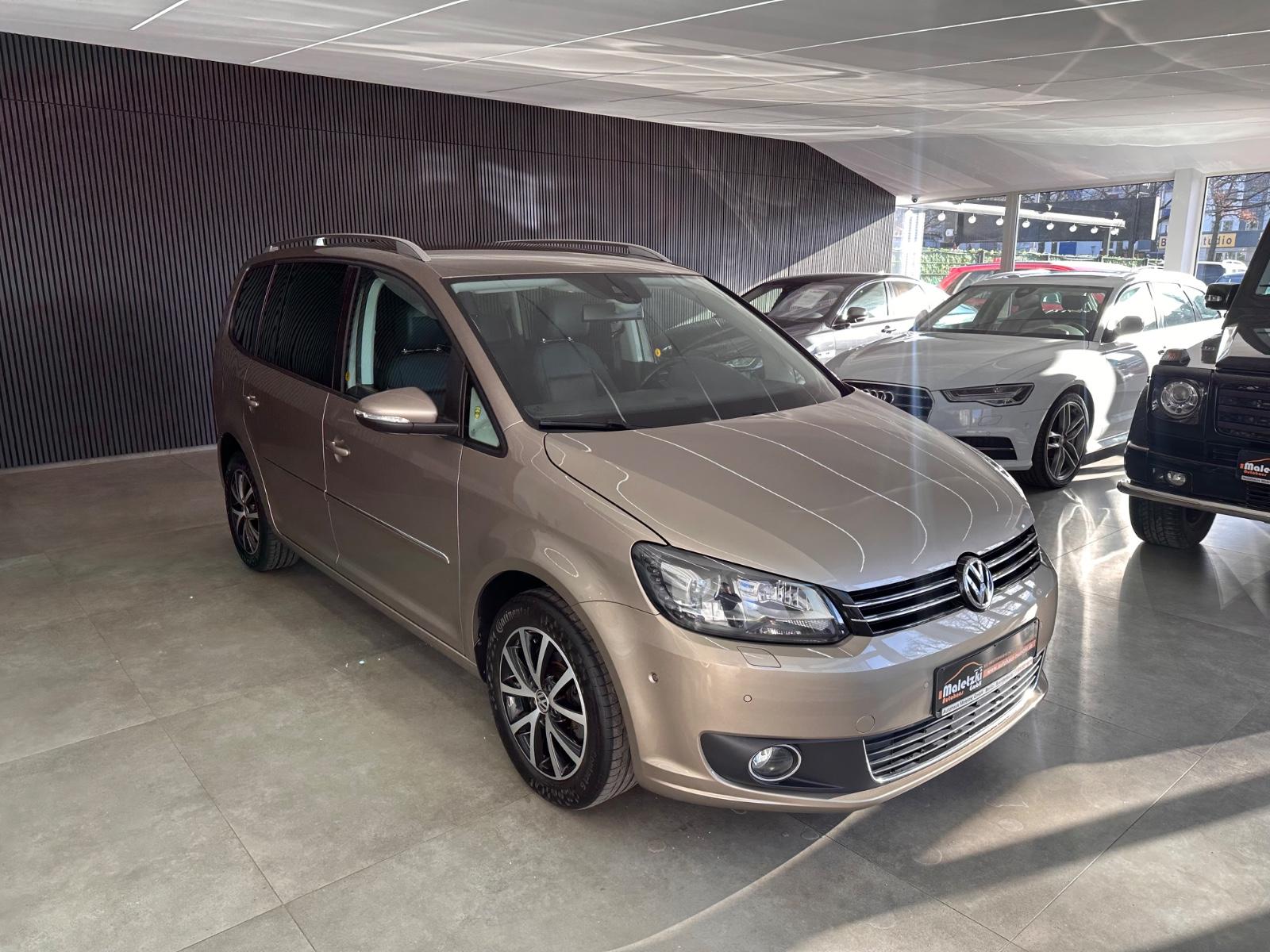 Volkswagen Touran 1.4 TSI Highline*1.Hand*DSG*AHK*Navi*SHZ*