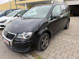 Volkswagen Touran 1.4 TSI Freestyle - Volkswagen Touran Freestyle mit Benzin-Antrieb