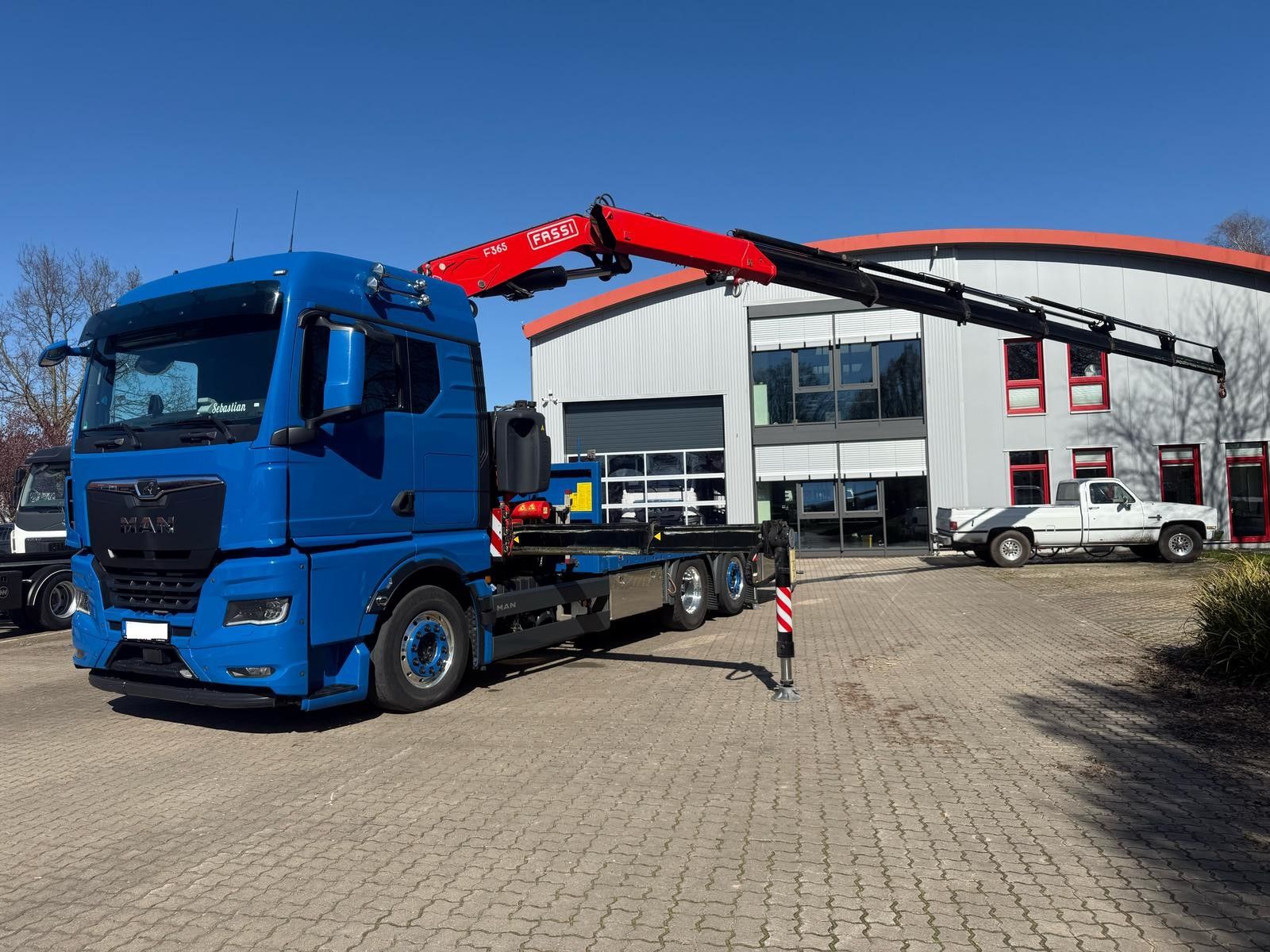Fahrzeugabbildung MAN TGX 26.640 mit Fassi F365A2.26 Containerpritsche