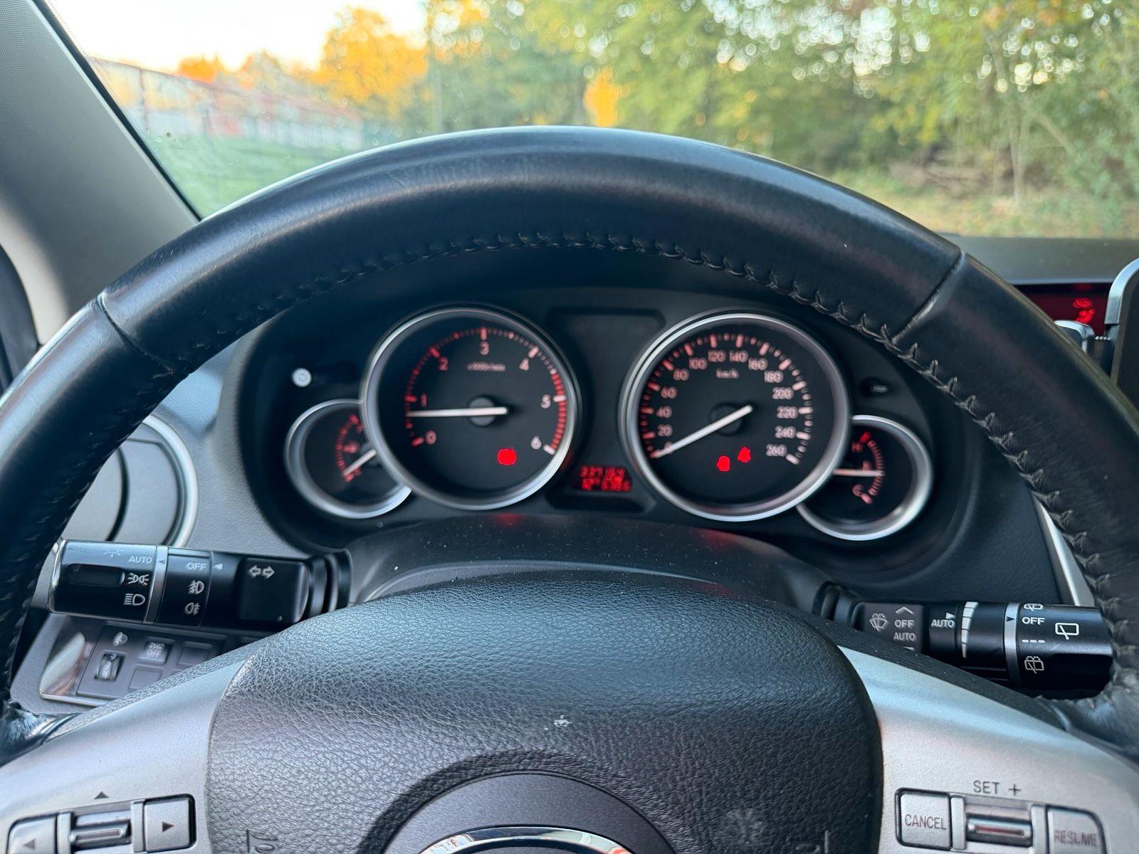 Mazda 2 2009 — photo 12