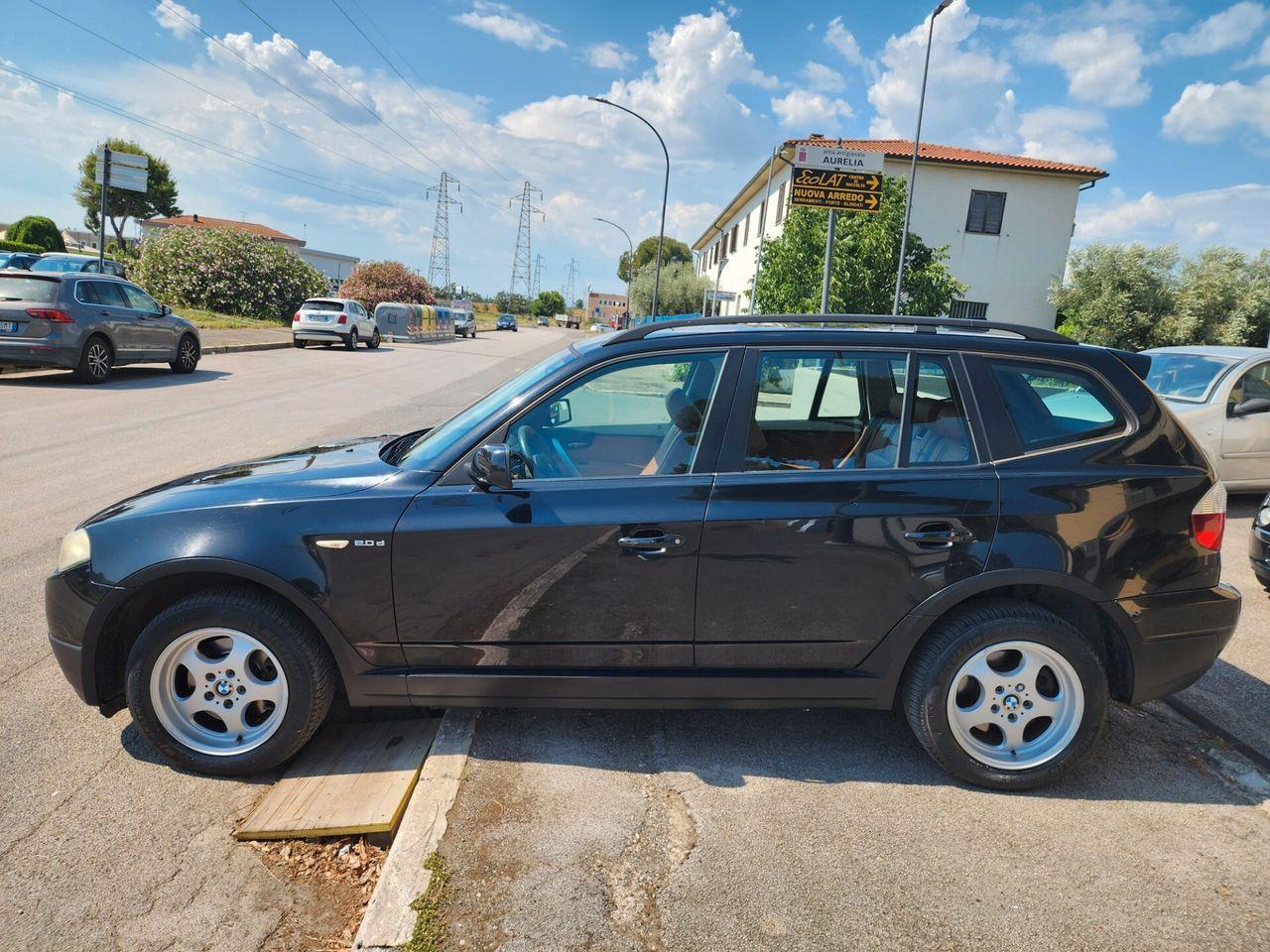 BMW X3 2008 — interior