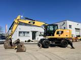CAT M 320 F - CAT Mobilbagger M320