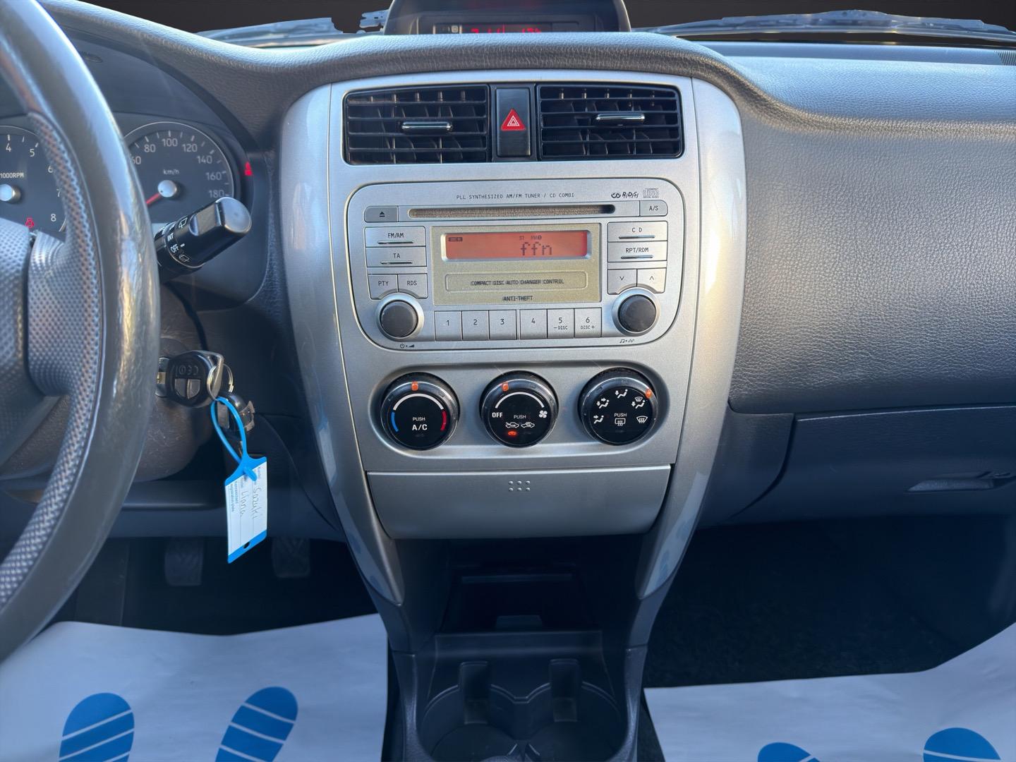 Suzuki Liana 2005 — photo 15