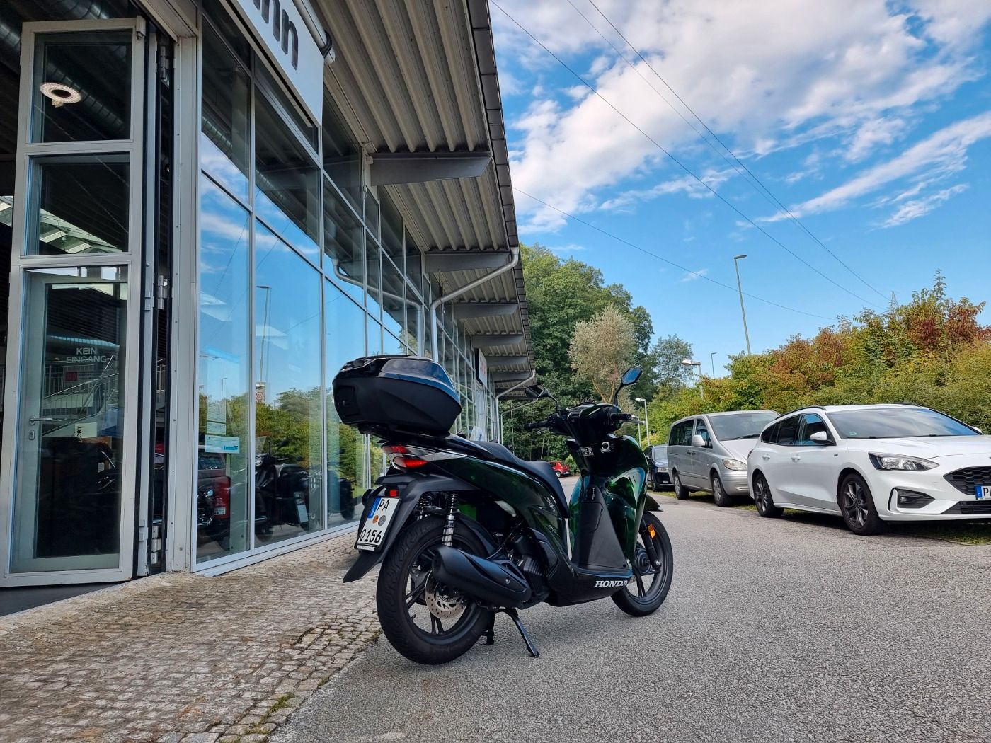 Fahrzeugabbildung Honda SH 125 i inklusive Smart-Topcase