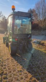 John Deere 1026R mit Kabine und Frontlader - John Deere Schlepper