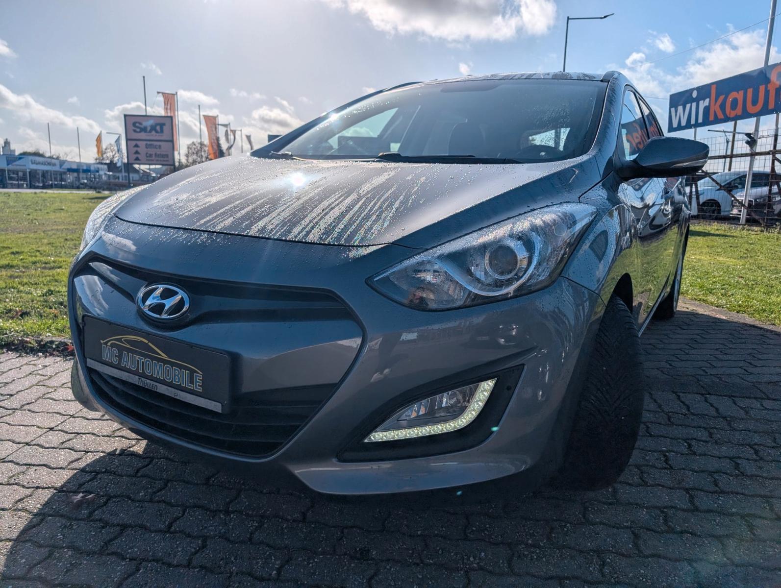 Hyundai i30 2014 — photo 9