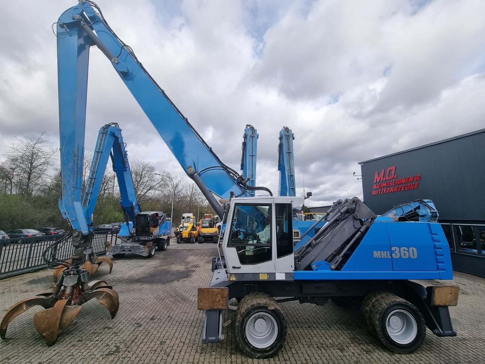 Fahrzeugabbildung Fuchs MHL 360 / AC / Magnetanlage /Polypgreifer /
