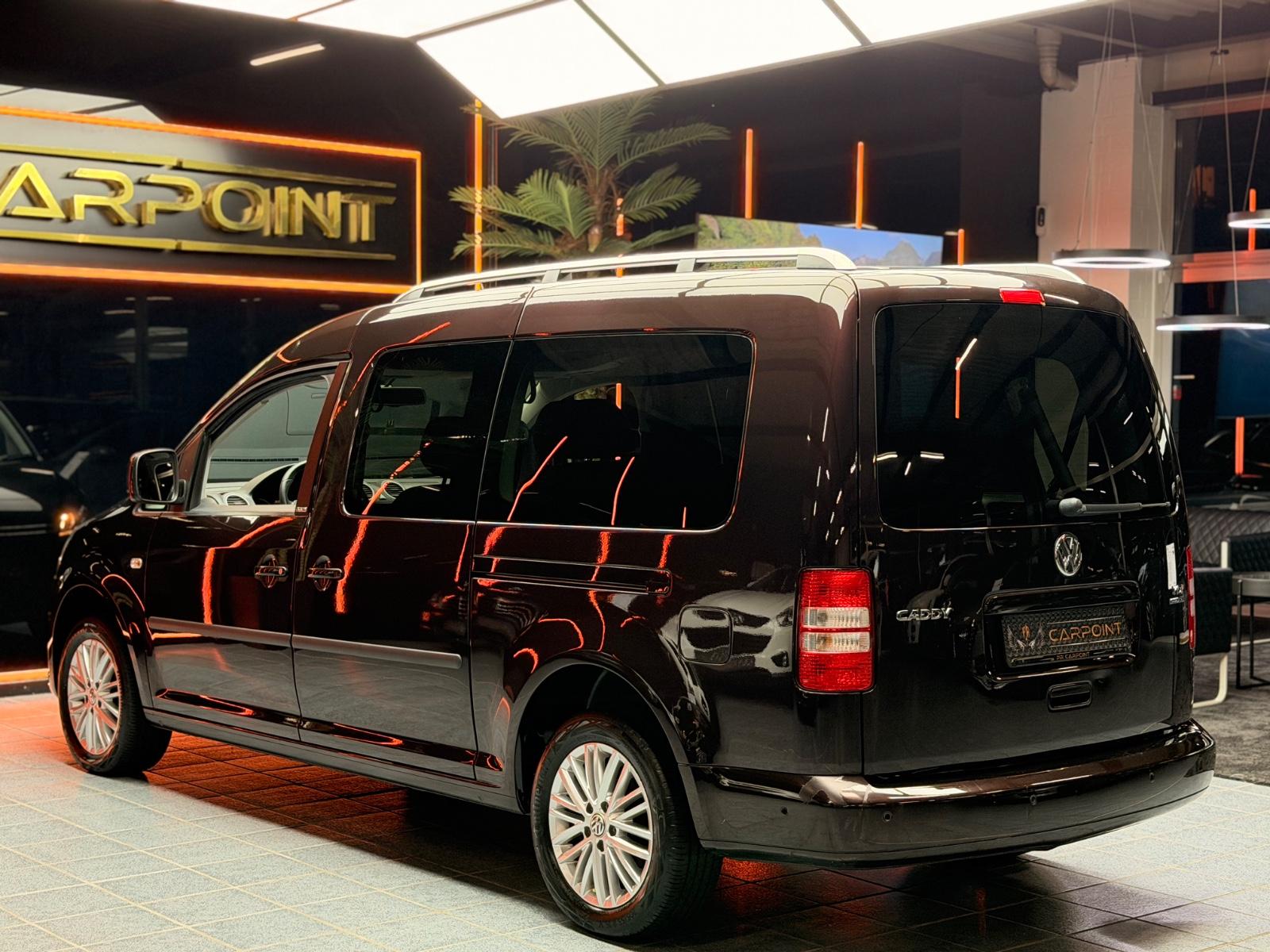 Volkswagen Caddy Maxi Kombi / Navi /7-Sitzer/Rollstuhl-Kran