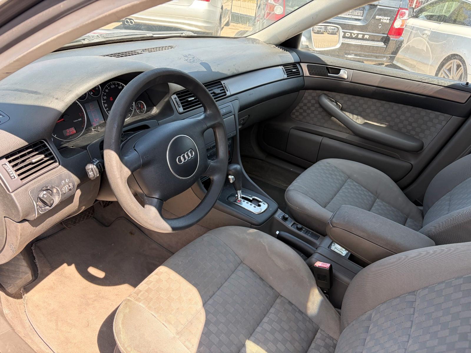 Audi A6 2004 — photo 9