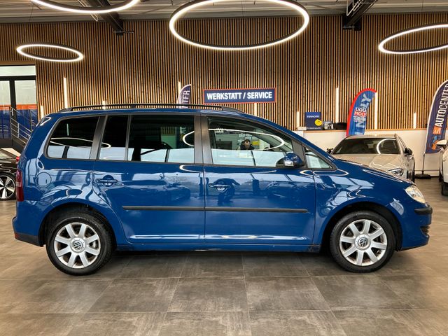Volkswagen Touran  *7Sitzer*Navi*DSG*Sitzh*BiXenon*