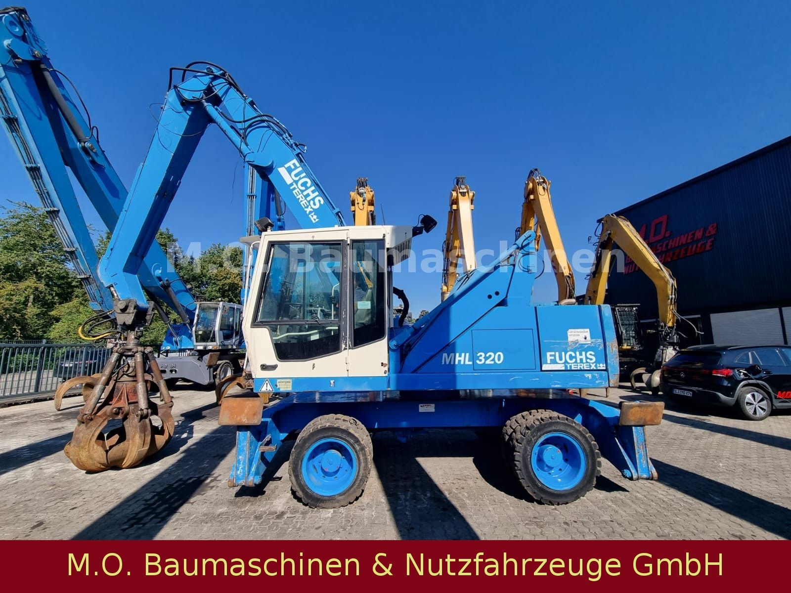 Fahrzeugabbildung Fuchs Terex MHL 320 / Polyp/ Liftkabine