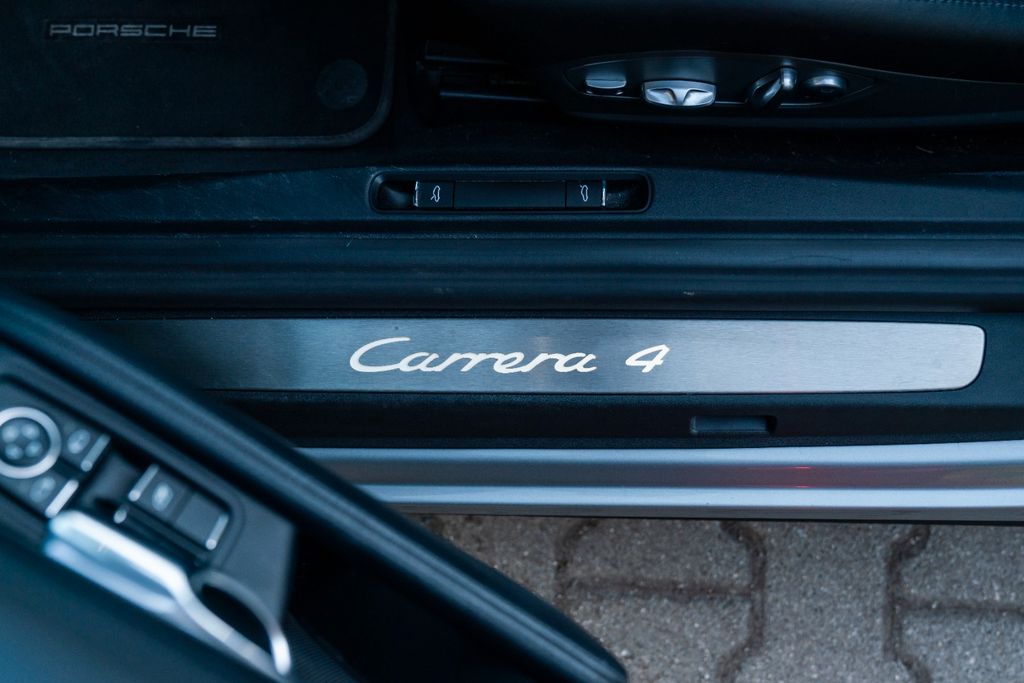 PORSCHE 991 Carrera 4 Cabriolet/ PASM / SPORT AGA / BOSE PORSCHE 991 Carrera 4 Cabriolet/ PASM / SPORT AGA / BOSE