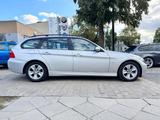 BMW 318i Touring + Klima + Navi + 8 fach bereift - silberne BMW 318