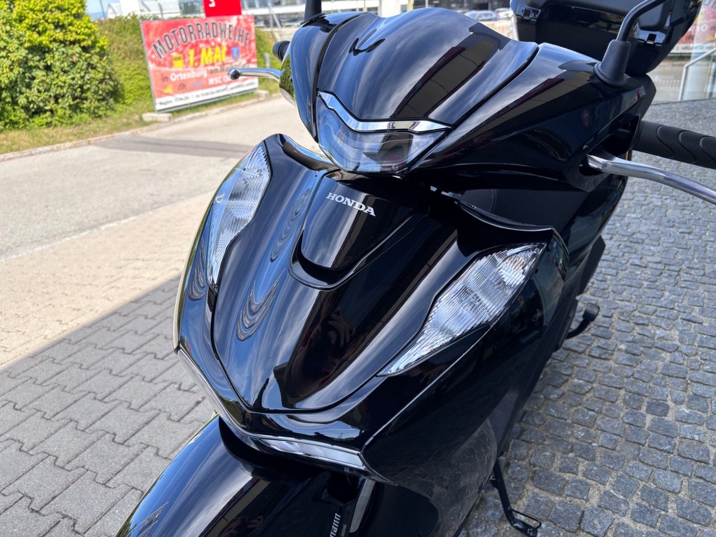 Fahrzeugabbildung Honda SH 125 i inklusive Smart-Topcase