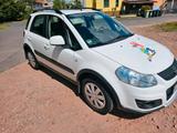 Suzuki SX4 - Suzuki SX4: Suzuk