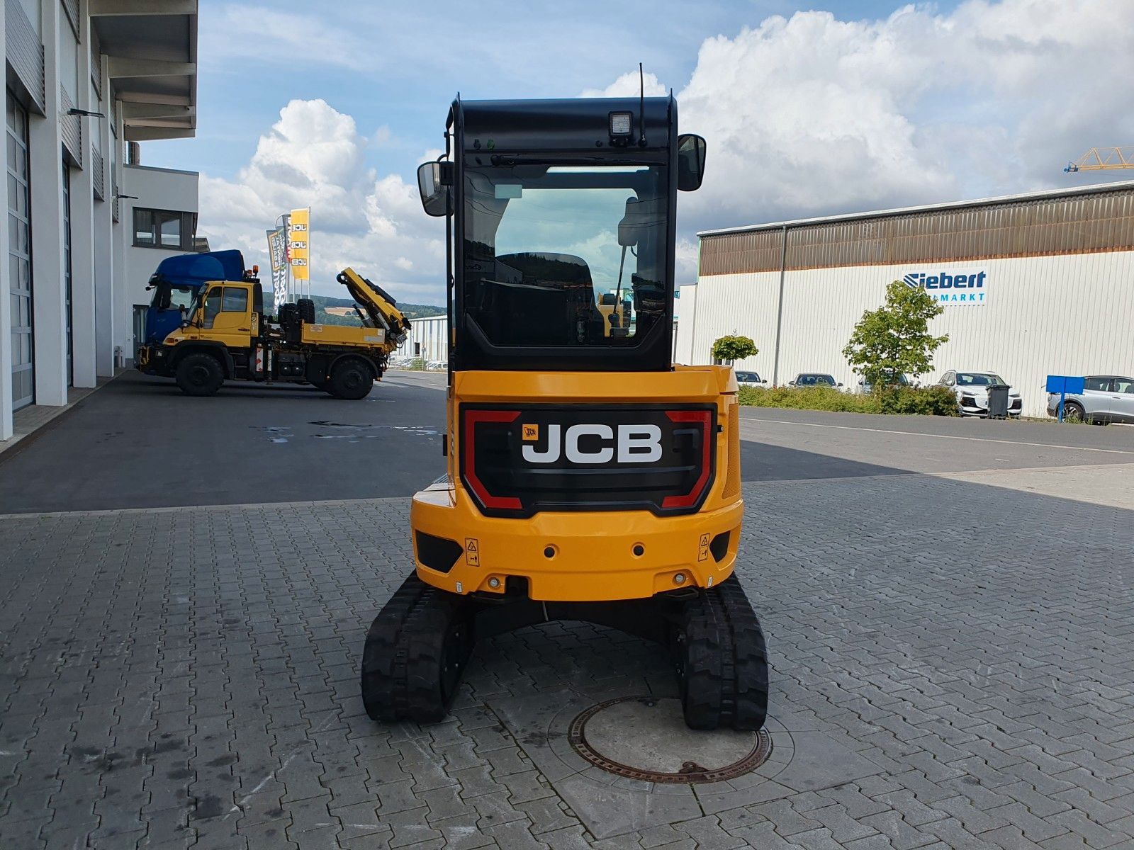 Fahrzeugabbildung JCB 26C-1 Pro Cab / Neufahrzeug / Planierschild