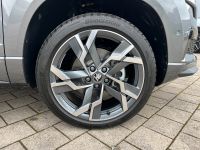 SKODA Karoq Sportline 2.0 TDI DSG 4x4 PANO AHK 5J GAR bei Autohaus Landmann & Maier OHG