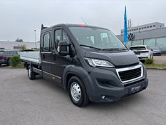 Fahrzeugabbildung Peugeot Boxer HDi 180,3.0L,L4,Pritsche,Doka 7-Sitzer,AHK