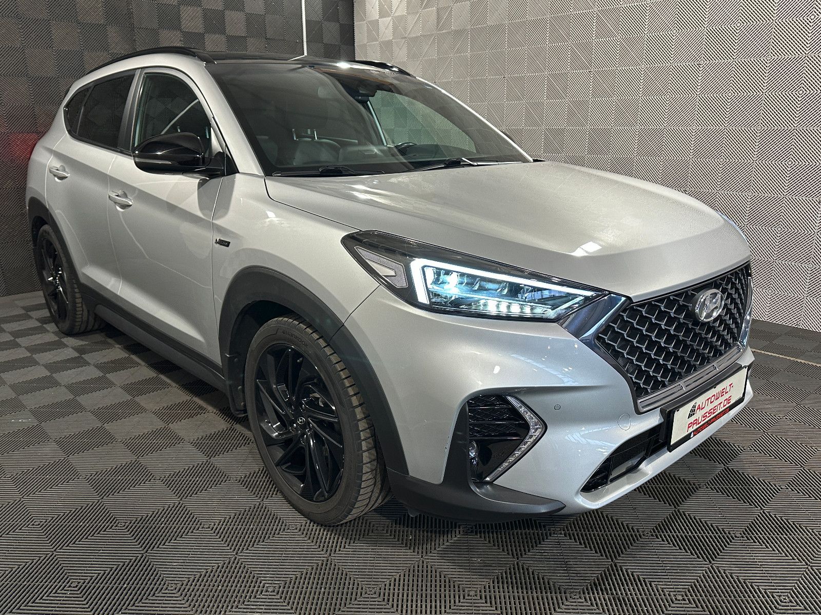 Gebrauchtwagen Hyundai Tucson Tucson 1.6 4WD*N LINE*LED-PDC-SHZ-R.KAM-NAV-SPUR in Horb am Neckar