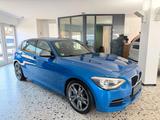 BMW M135i xDrive | Sportabgas | Navi Prof. | H&K - blaue BMW M135
