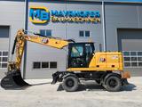 CAT M318 - CAT Mobilbagger M318