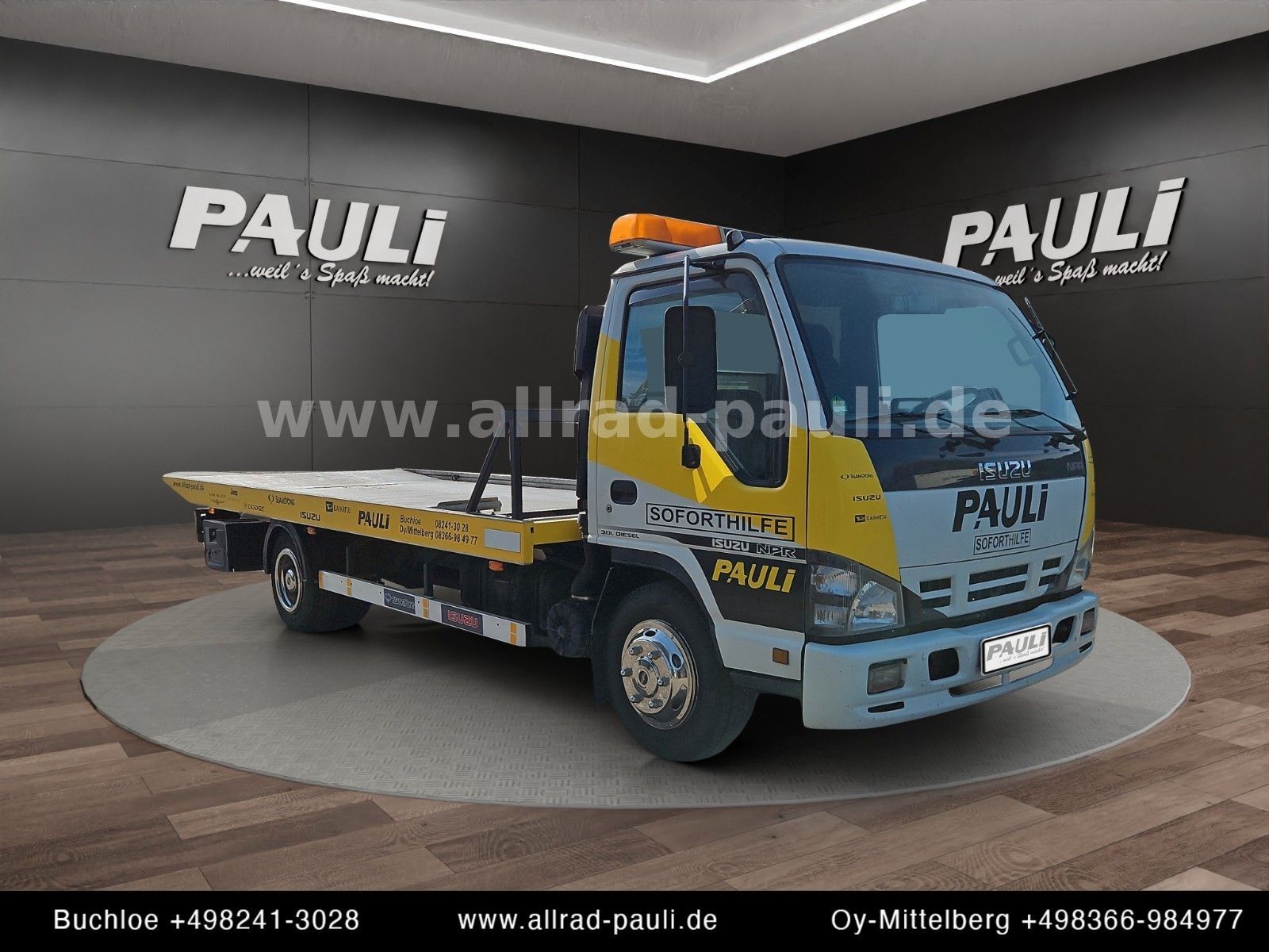 Isuzu N-Serie NPR85P - Schlepper | Schiebeplateau