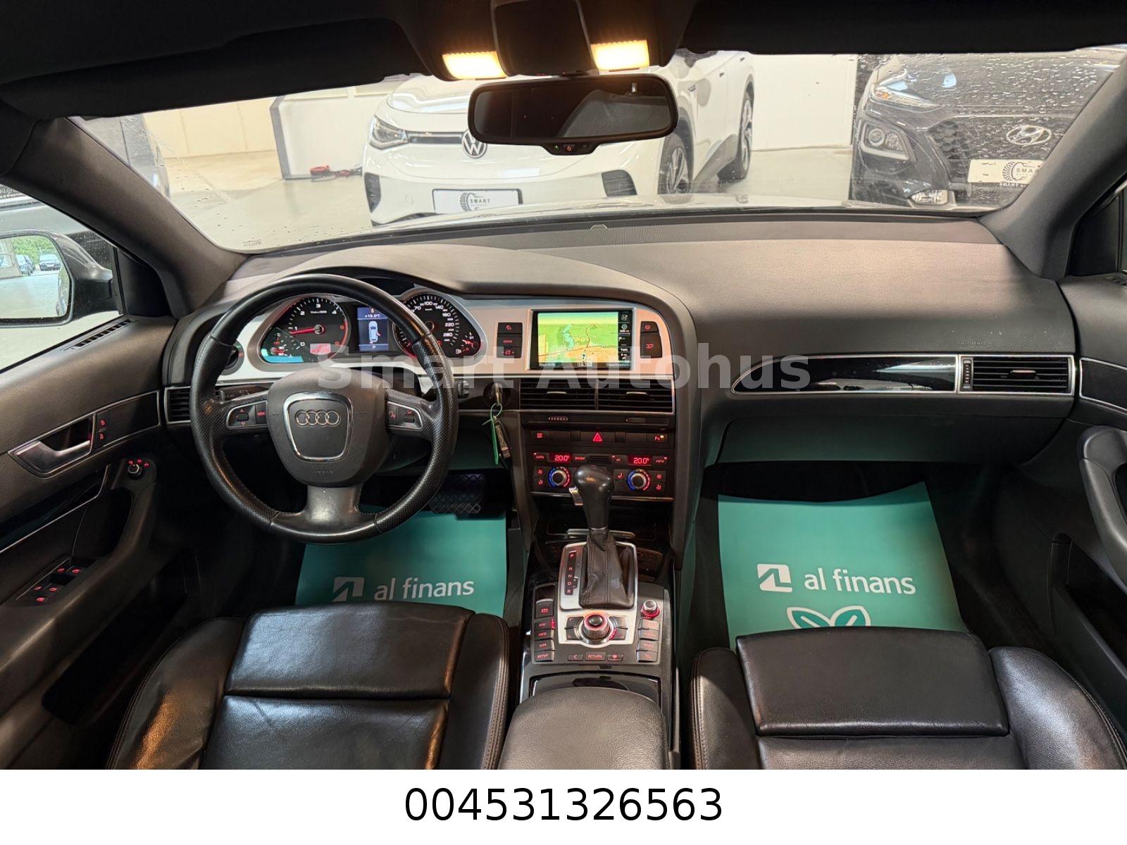 Audi A6 2009 — photo 14